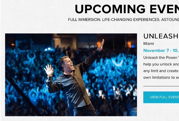 Tony Robbins presenting to audience